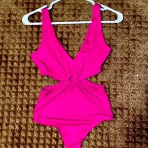 Pink body suit with open side
